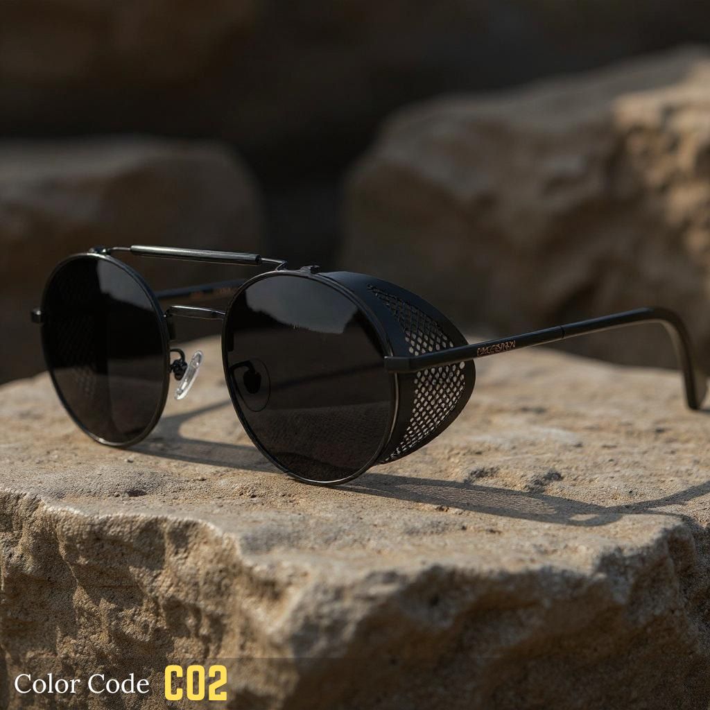 Black sunglasses with mesh design on a stone surface, labeled 'Color Code CO2'.