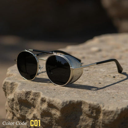 Sunglasses with metallic frame and dark lenses on a stone surface